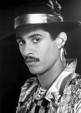 Black-and-white portrait of Michael Chambers (Boogaloo Shrimp) in costume from the 1980s.